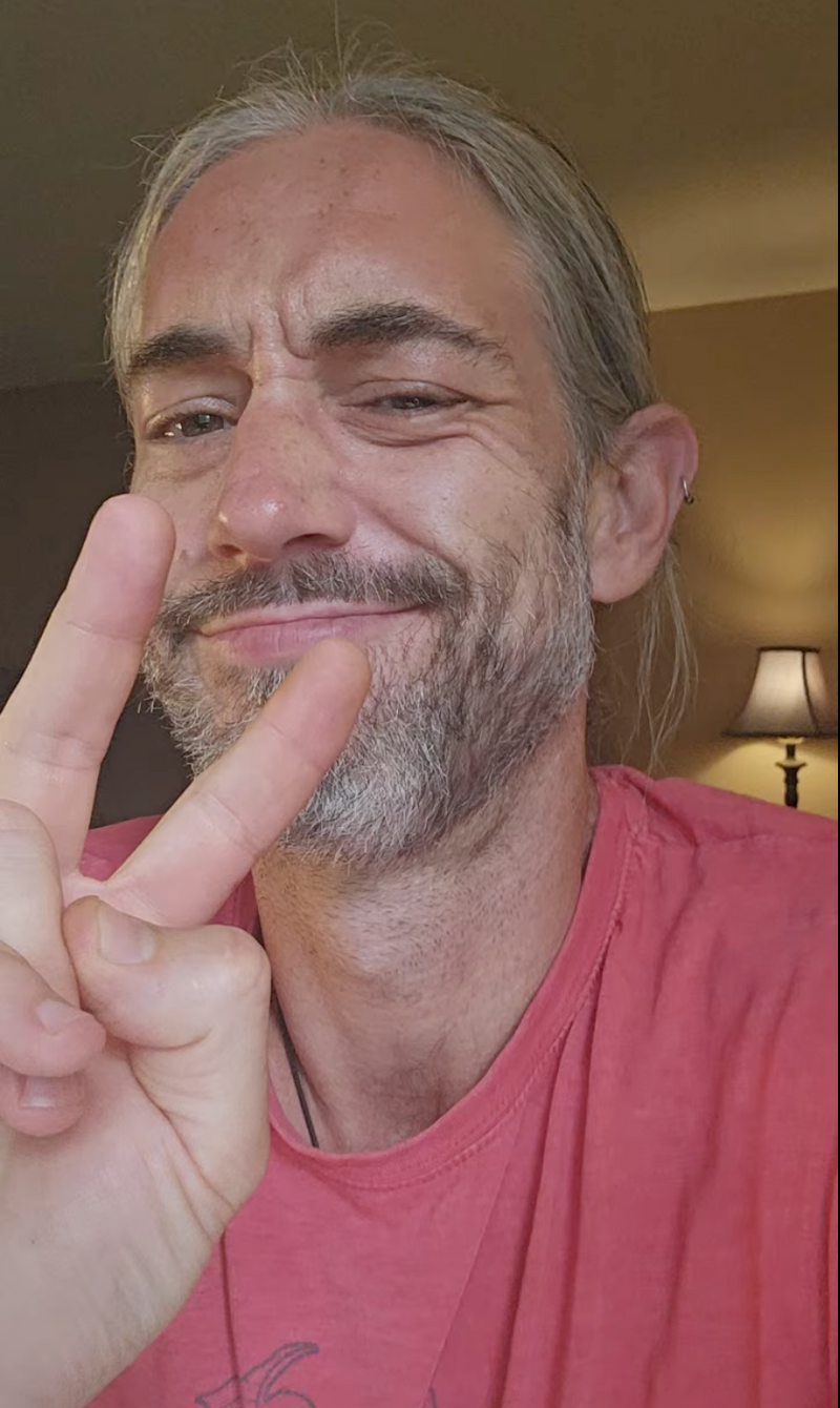 Captain Jezzatron giving a peace sign