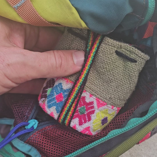 Pulling the Feather Deck, bound in cotton cord, from its Peruvian bag