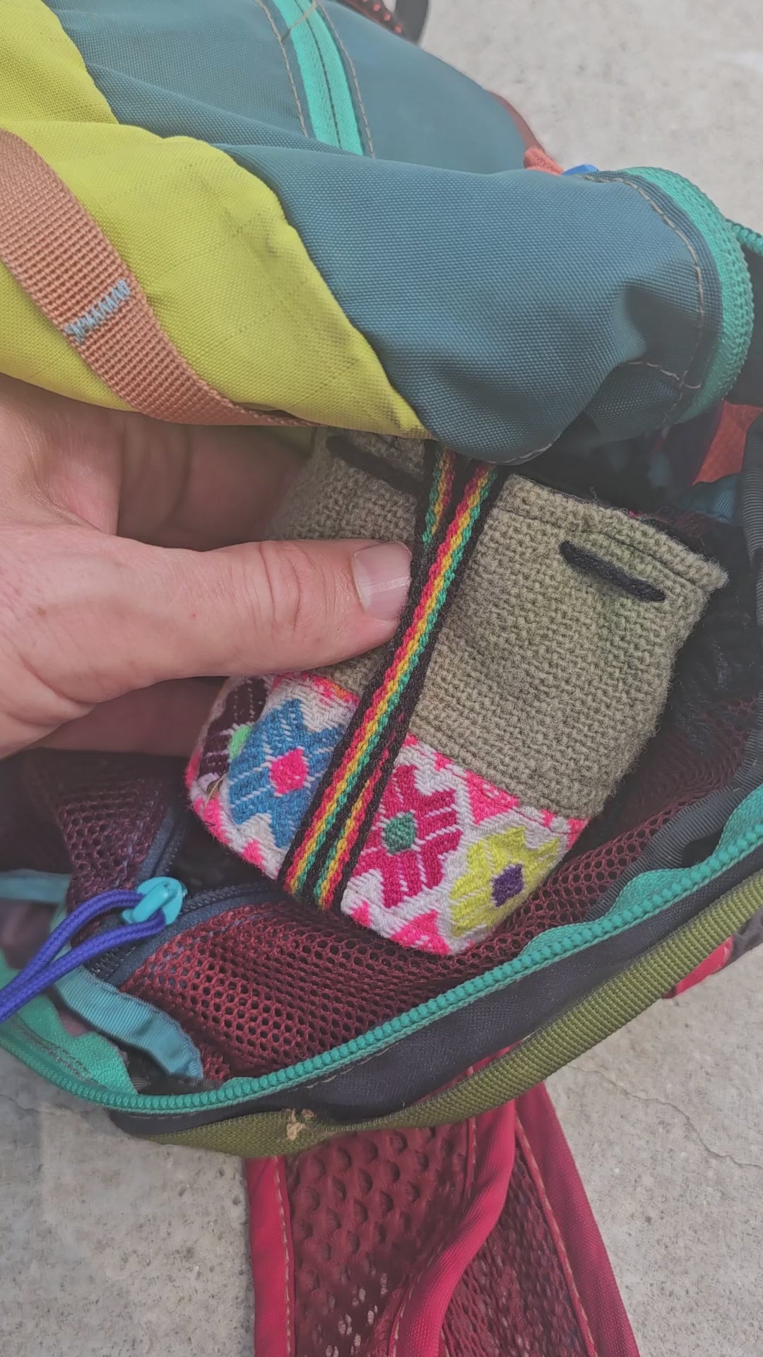 Pulling the Feather Deck, bound in cotton cord, from its Peruvian bag