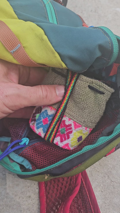 Pulling the Feather Deck, bound in cotton cord, from its Peruvian bag